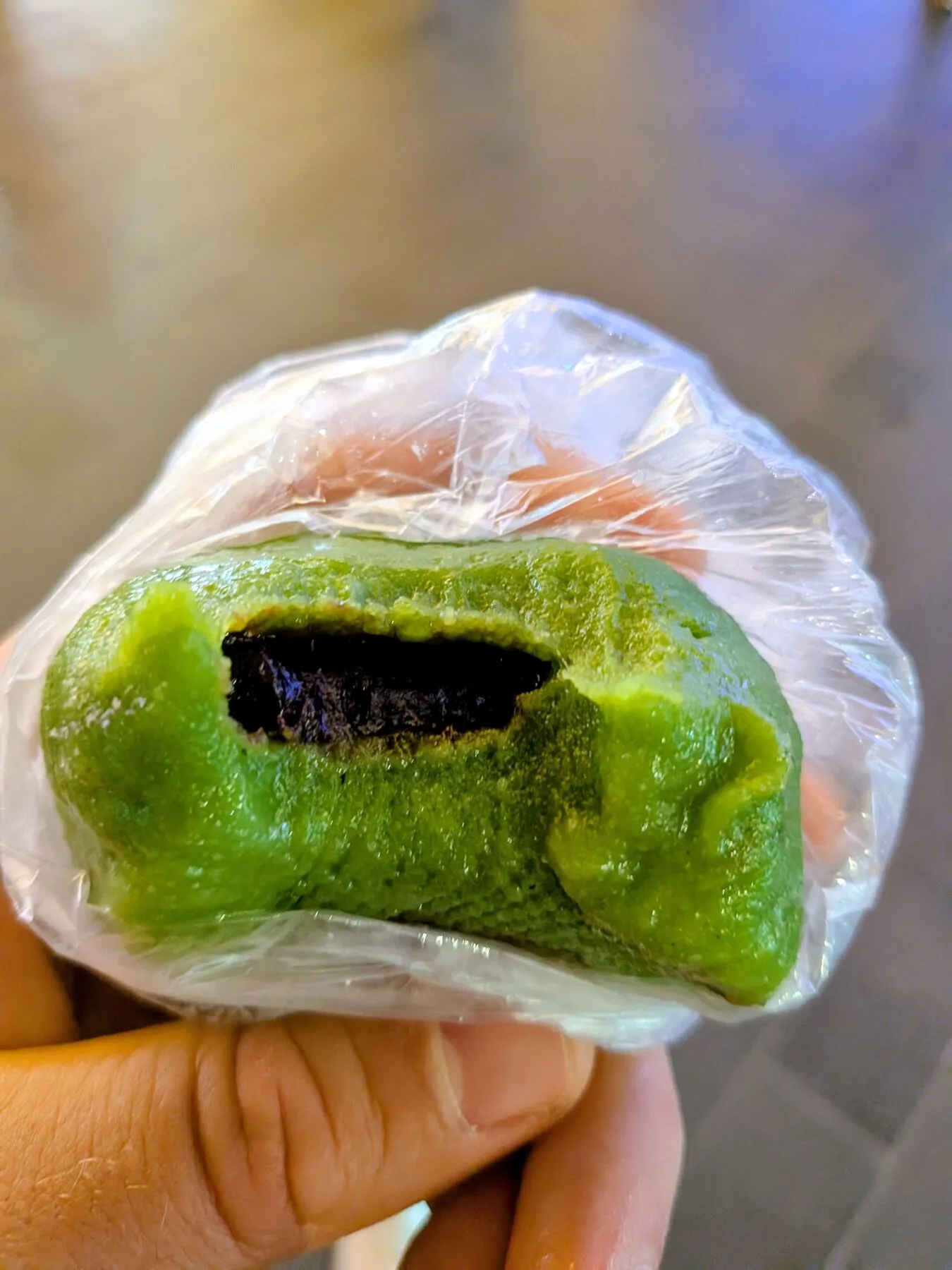 Tasted vaguely plant-like, maybe bamboo-like, and had bean paste inside