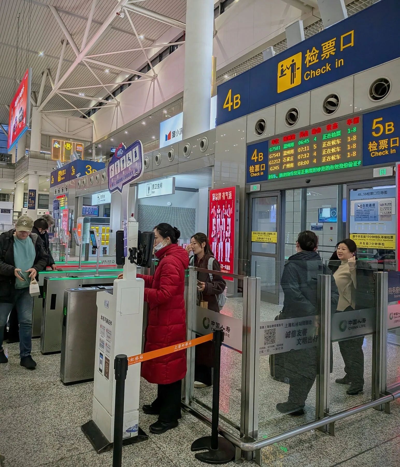 As long as you have a booked ticket, you just swipe your passport on the scanner