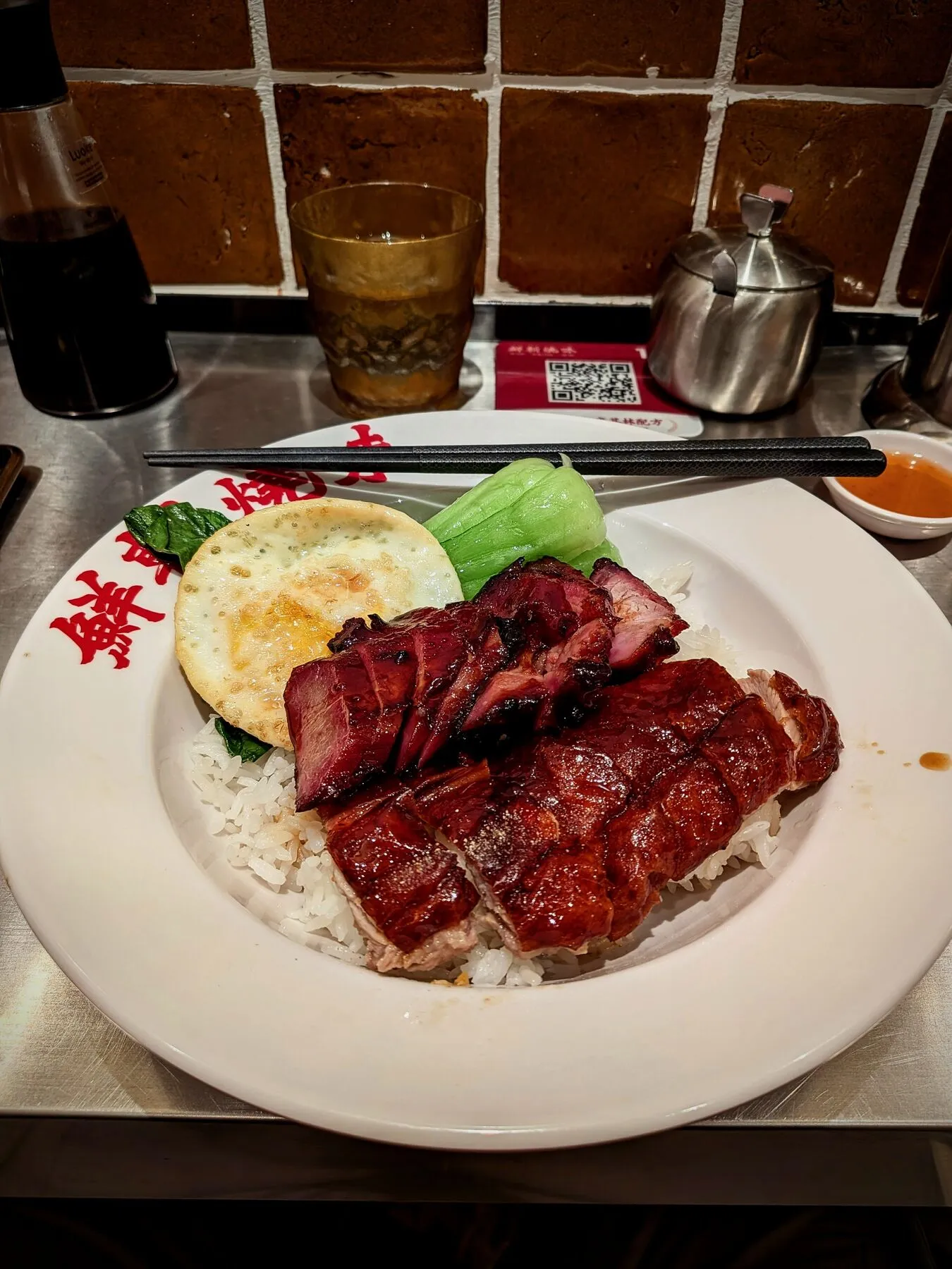 Roasted duck with the usual local vegetable, along with rice and an egg