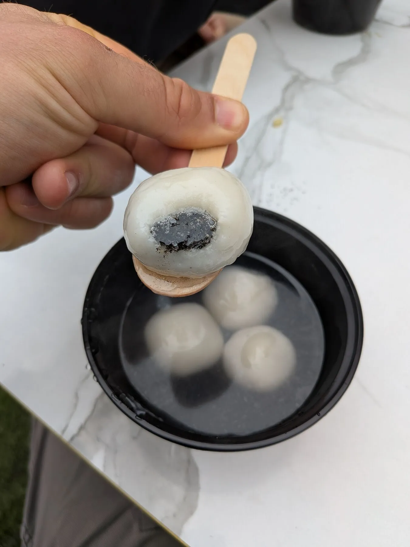 Sesame balls Hao ordered for me in the old street. They were delicious; the black paste inside reminded me of tahini.