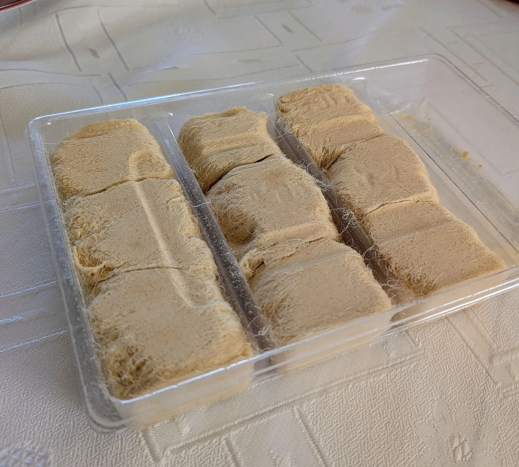 Dragon's beard candy, a traditional candy made by hand pulling sugar into thousand thin threads. The seller had been really happy that somebody not local was trying his handmade dessert.